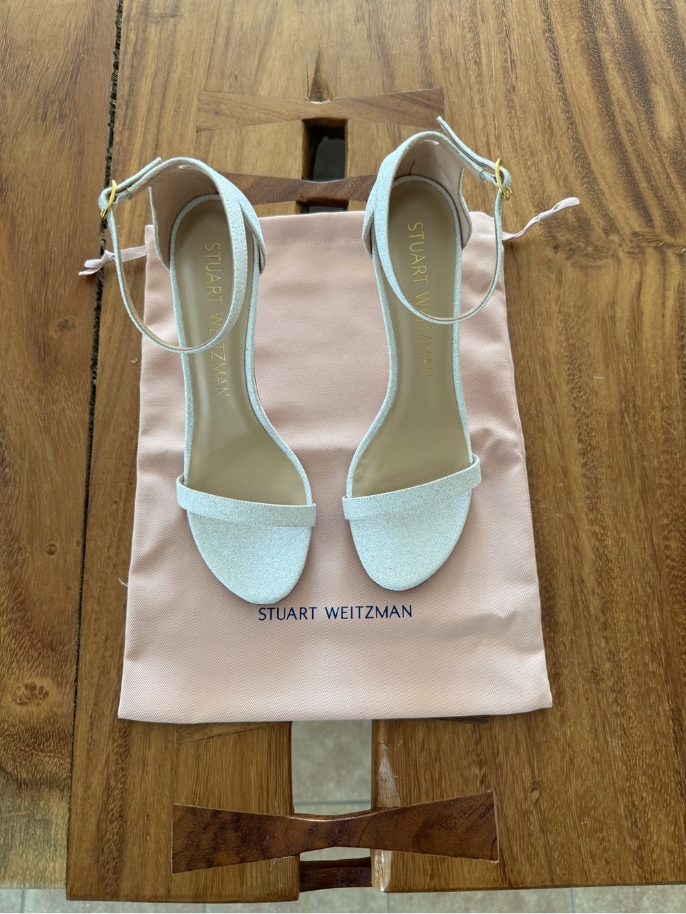 Stuart Weitzman **Nunaked Straight” White Fine Glitter Ankle-Strap Heels